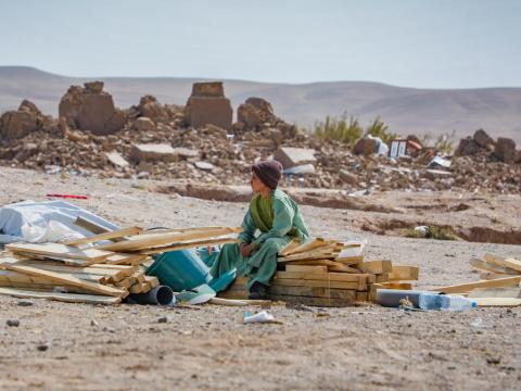 a child sitting on a pile