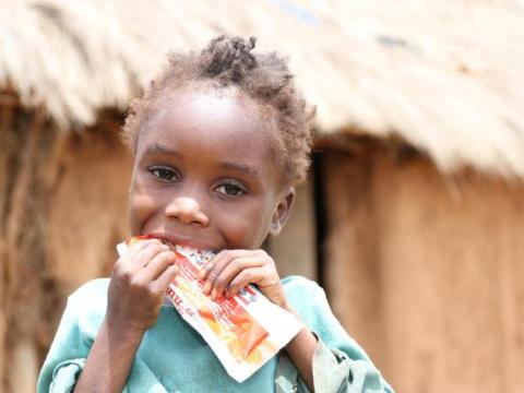 A child eating a protein snack