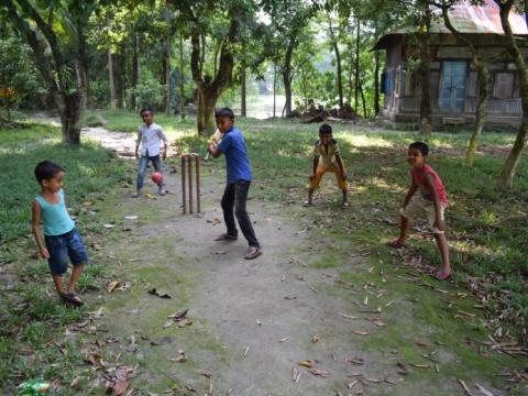 Children playing cricket
