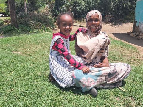 Nani smiling with her mother