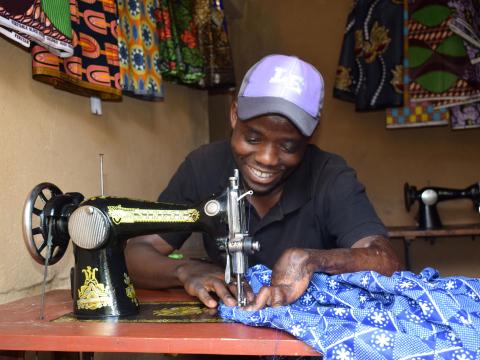 Tuyisenge making clothes