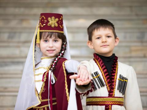 Children wearing Georgia traditional dress