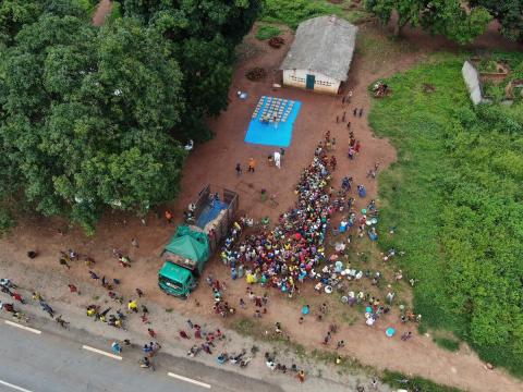 Drone shots of a World Vision food distribution.