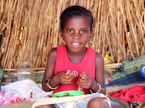 Hawa enjoying grapes