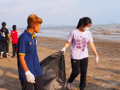 85 adolescents who are part of the Youth Creativity for Sustainable Environment project pick up trash at a beach in Chantaburi province, Thailand