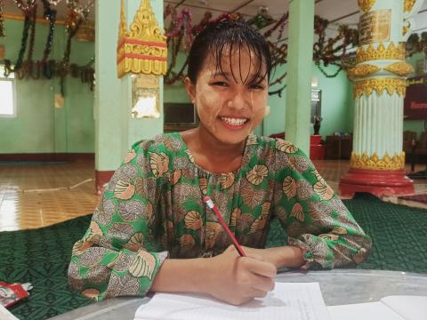 Hnin enjoys attending reading club 