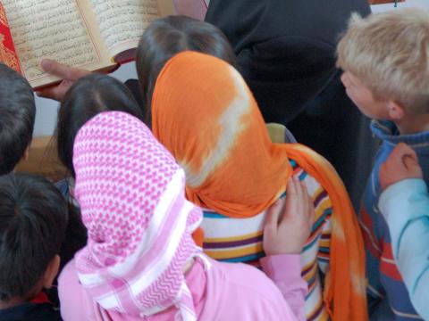 Children in central Bosnia and Herzegovina visiting a mosque and a church in their birthplace.