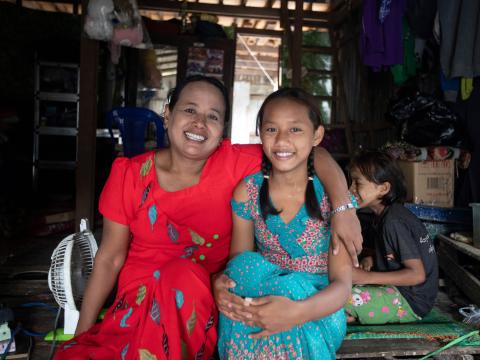 Ei and her mother at their house.