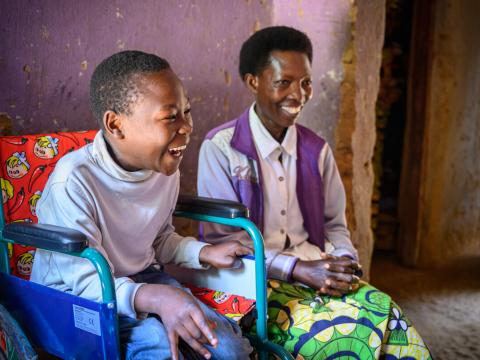 A sponsored child provided with a wheelchair