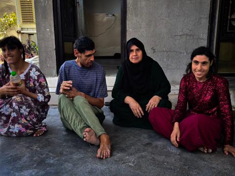 Naima with her three children who live with disabilities. Photo credit: Dastan Sabah & Ziryan Kamaran Sideq © World Vision 2024.