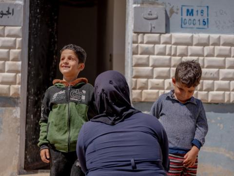 Um Khaled* with her children in front of her house World Vision Syria Response - Zaher Jaber