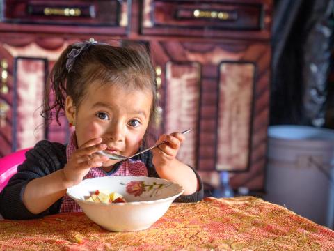 a little girl eating