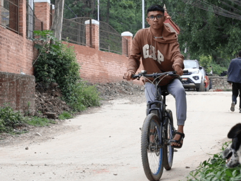 Rahul riding the bicycle