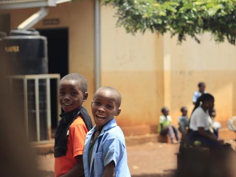 Hundreds of children from a primary school in Milange district receive their first meal.