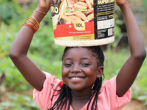 Aurora smiles with access to clean water