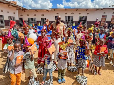 Happy children after receiving the school materials