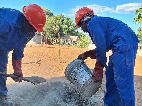 Gilda Chaúque and Lúcia Ponja working hard together in Sanitation Marketing activities 