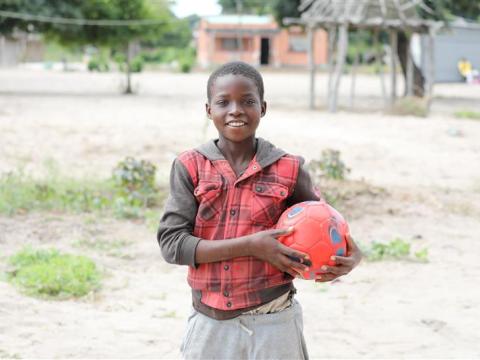 Azaria holding a ball 