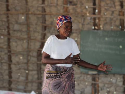Pastor Cecilia explaining about how to overcome malnutrition 