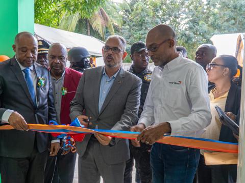 Cutting the ribbon to the new health center