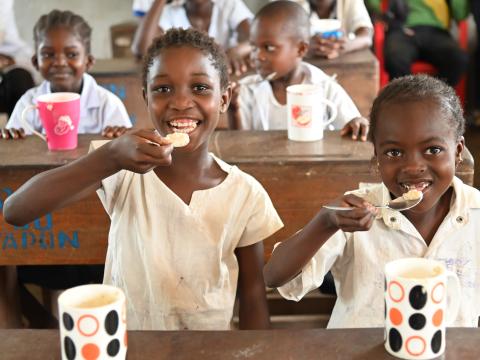 Children eating porridge