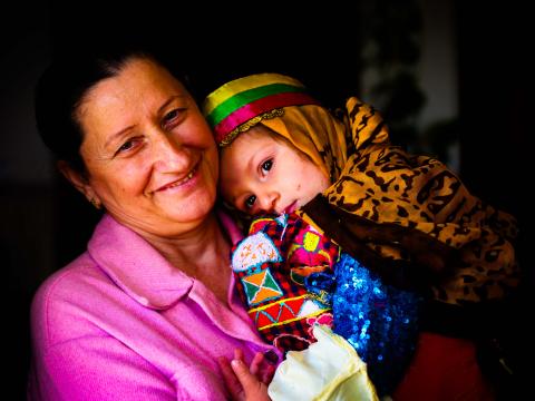 Ruwaida, a Safe Return Project Participant, and her granddaughter posed for an Easter photo, celebrating the Easter. 