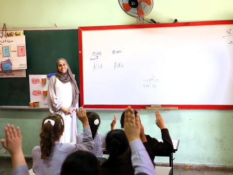 a palestinian teacher in a remedial education class