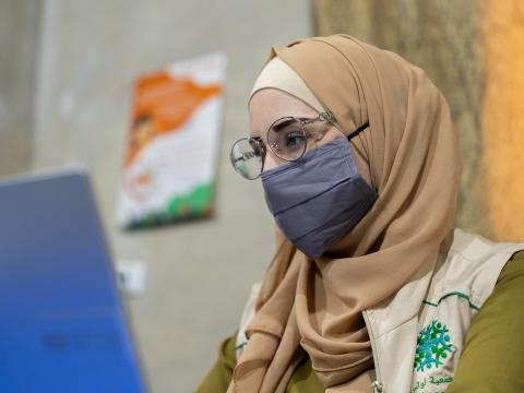 Salam working in her organization
