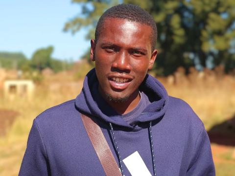 Malibongwe standing outside the Inkhundla centre during the RHM training.