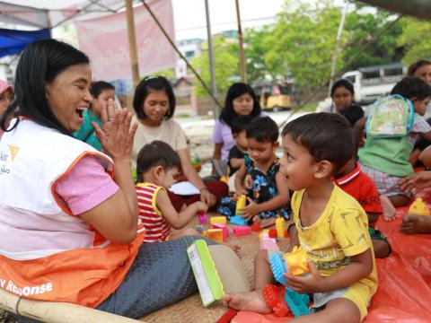 WV Staff engaging children at the child-friendly space