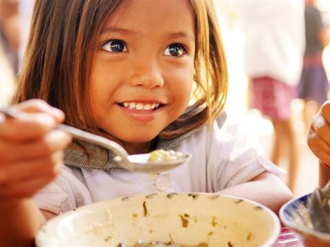 Asia girl eating rice- food