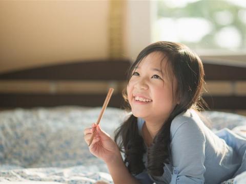 A girl thinking and solving a problem