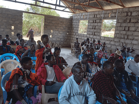 A woman contributing during CVA engagement session in Ngurumani