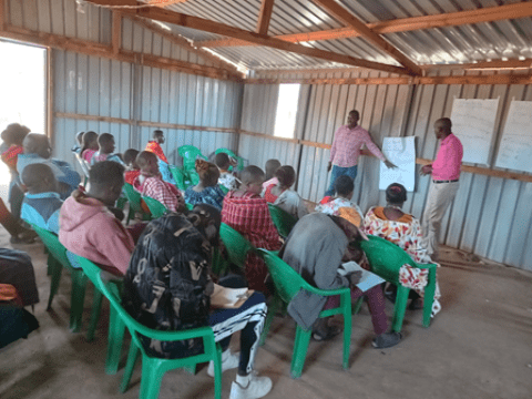 WV Kenya Advocacy Director-Mr. Elijah Bonyo taking CVA members through the stages of empowerment for effective community advocacy in Maparasha-Kajiado County