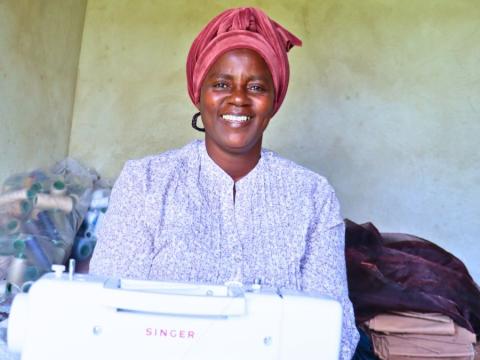 Nonhlanhla working on orders from customers who sought her sewing services.