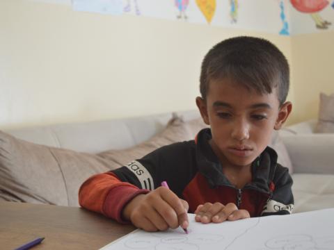 Adam*, a child participant who benefited from the medical support provided