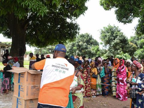 A scene of food distribution in Uvira