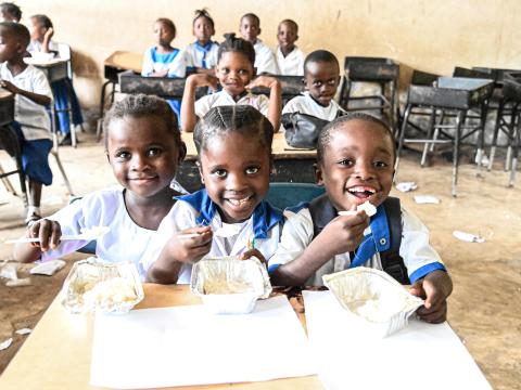 Children eating porridge