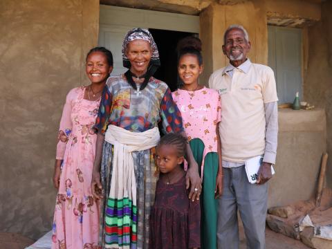 Gebregzihabeher with his family at their home