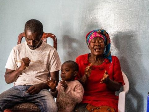 Beneficiaries Praying