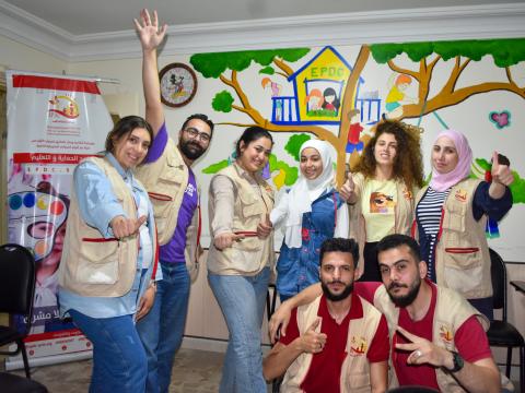 Sarah posing happily with the project team.