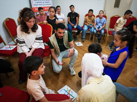 Palestinian Children take part in a psychosocial support session