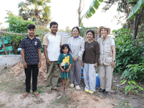 Champa’s family, her husband, two daughters, her son, and World Vision’s Regional Leader, Teresa Ferrari.