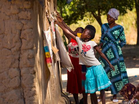 Hasina participates in home-schooling activities in Mposa.