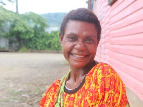 Woman farmer sitting outside