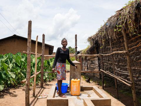 Marie at a fetching water point