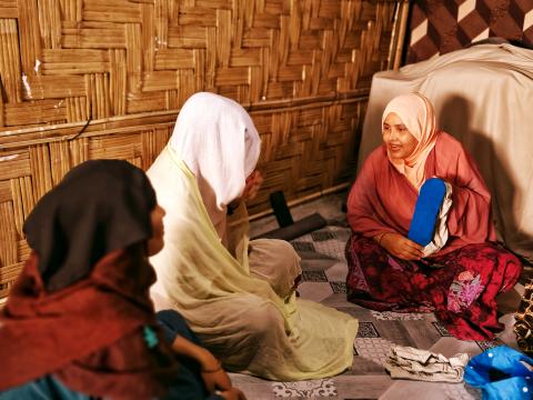 Humaira demonstrating how to use reusable pads in session