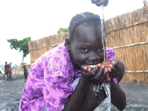 Madel -- girl child drinking water