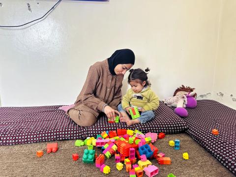 A mother with her toddler in the West Bank