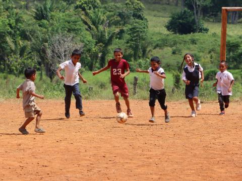 children playing soccer